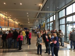 Crowd in the Austin Airport awaiting WWII and Vietnam War veterans