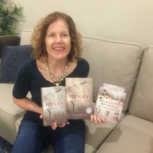 Katrina holding the Czech edition and the Polish Edition of Henry
