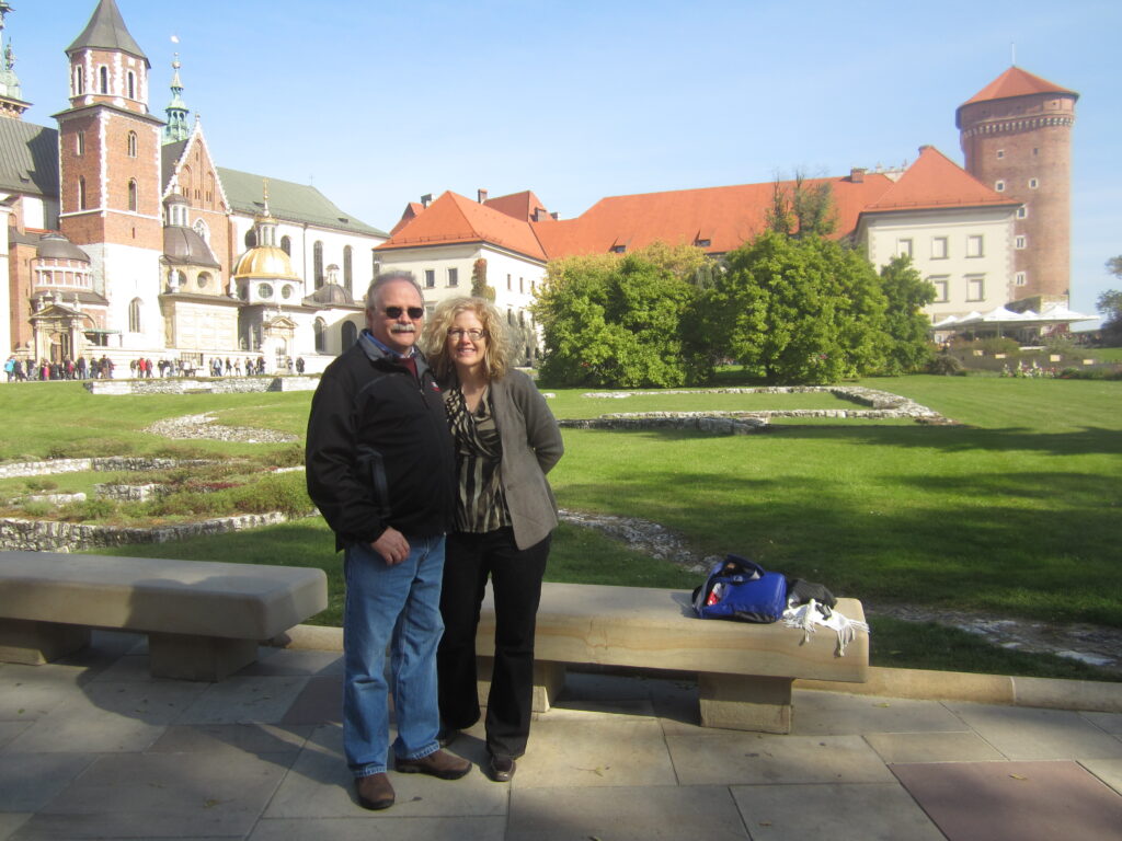 Katrina Shawver and husband in front of Wawel Castle, Kraków. 2013. Celebrate Polish heritage in person.