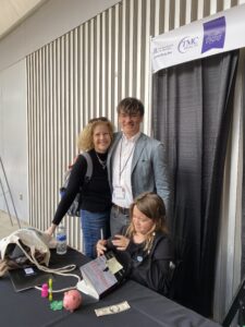 Author Katrina Shawver with author Jack Fairweather at the Tucson Festival of Books, 2025. 